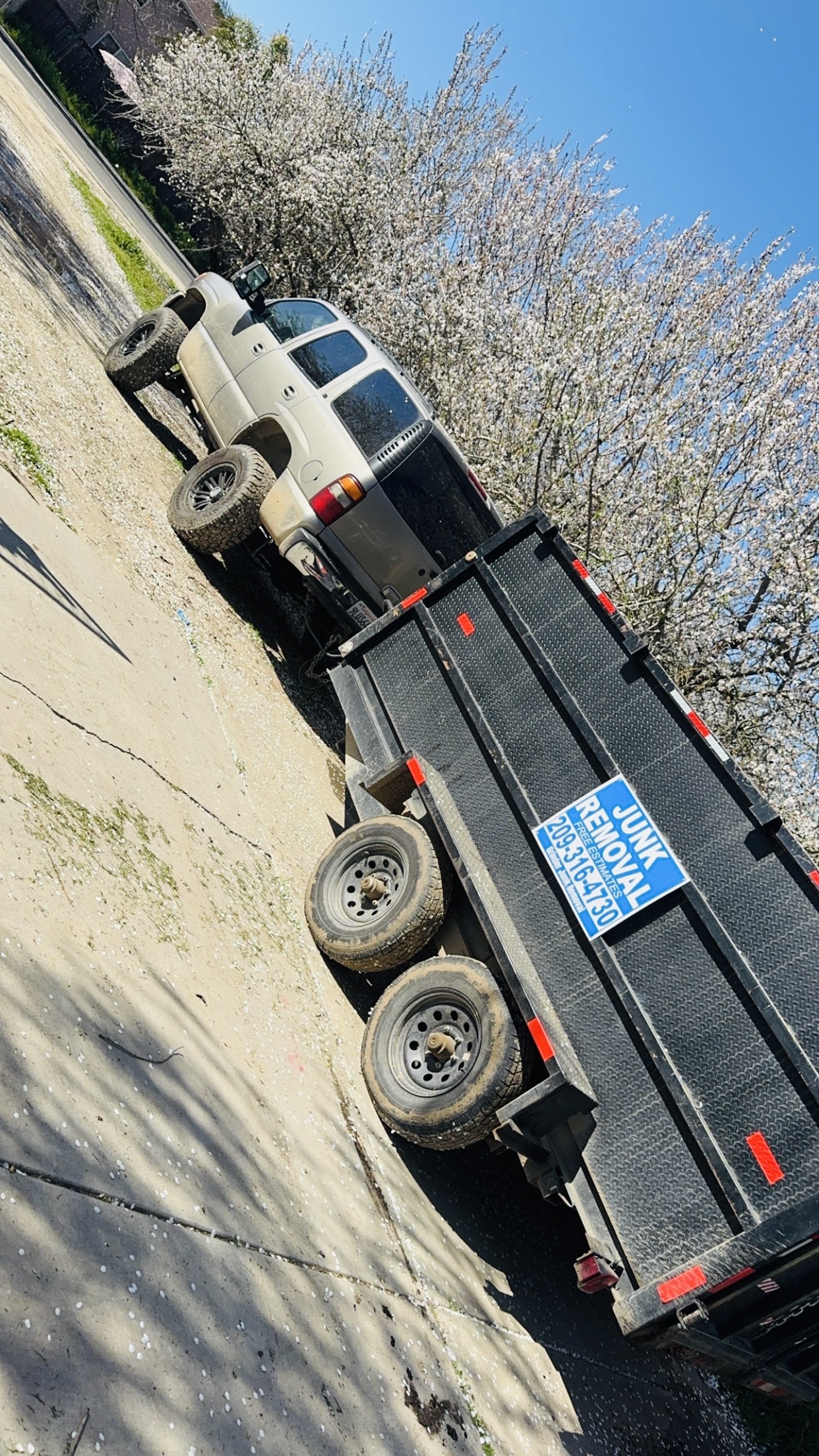 Grinder Junk Removal truck and dump trailer